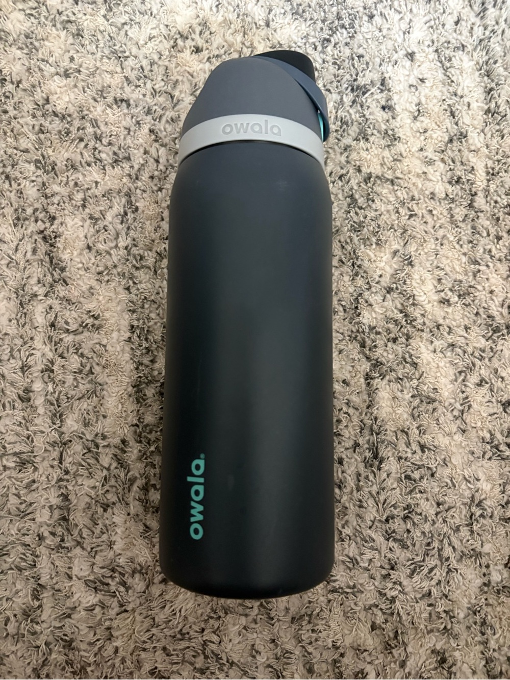 Dark grey owala water bottle